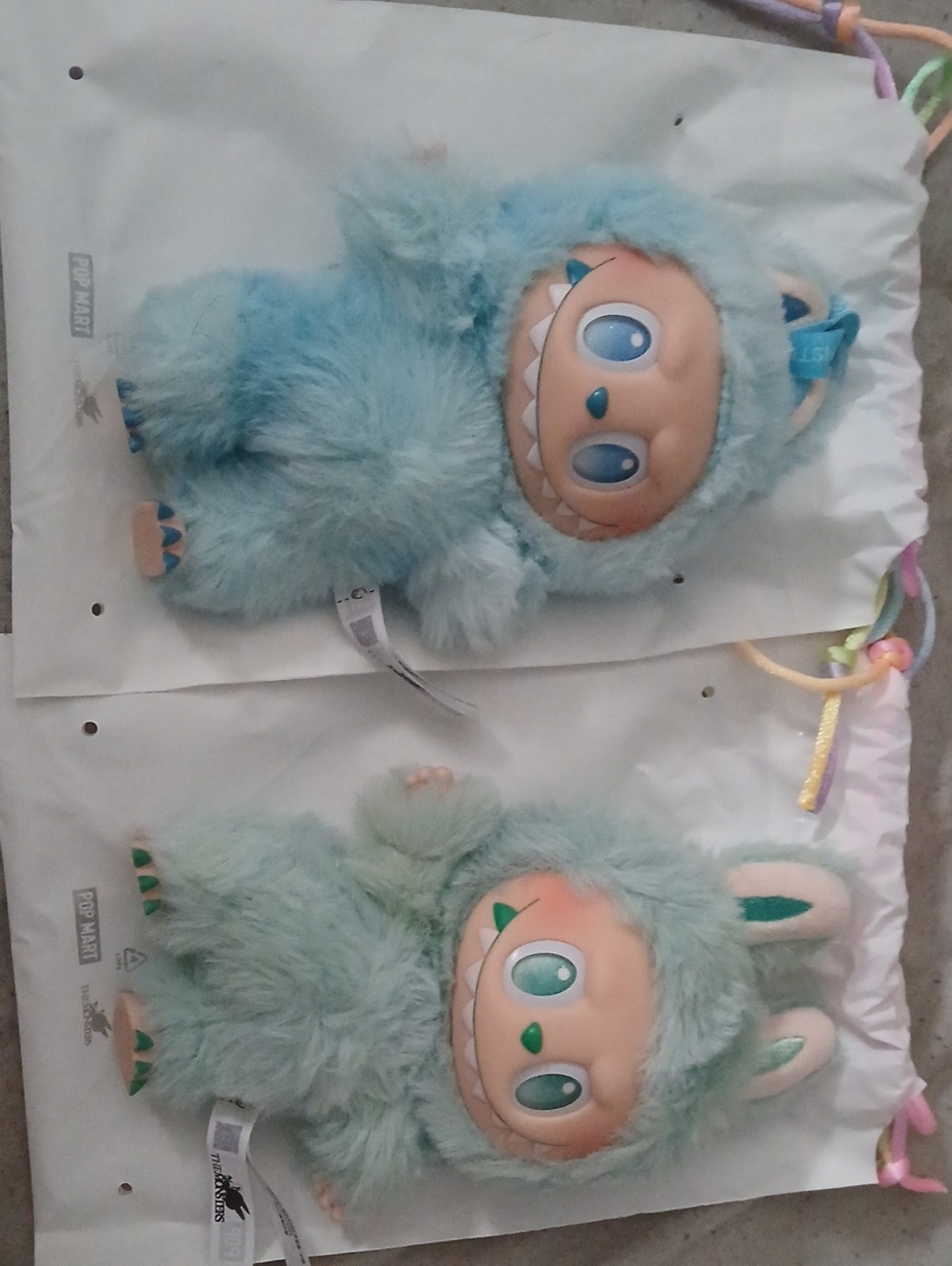 2 Labubu Dolls